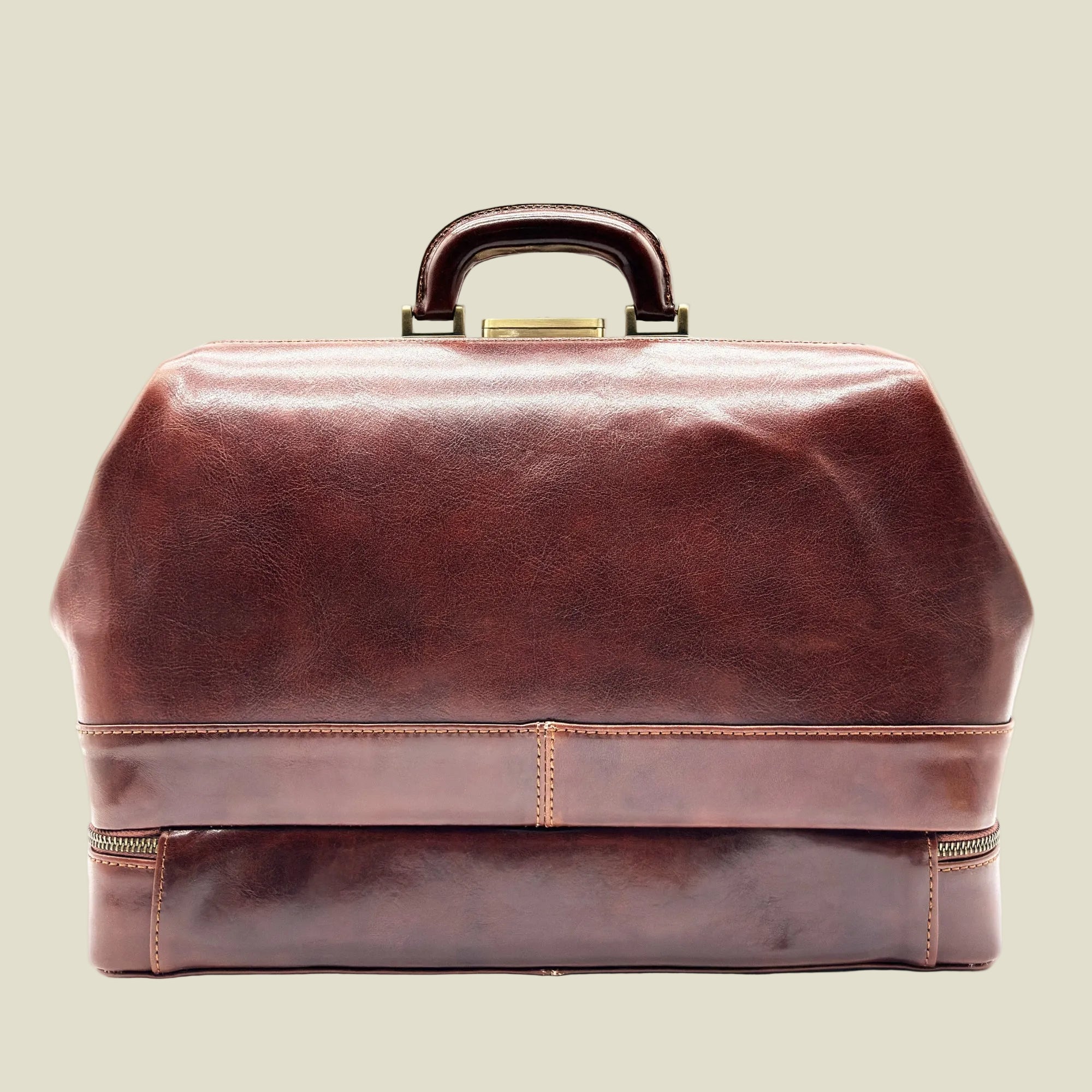 A dark brown leather doctor's bag or briefcase-style case with a top handle, shown against a plain white background.